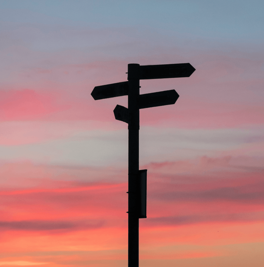 A signpost against a sunset sky — grief and loss therapy with Dr. Sepida Sazgar, California psychologist